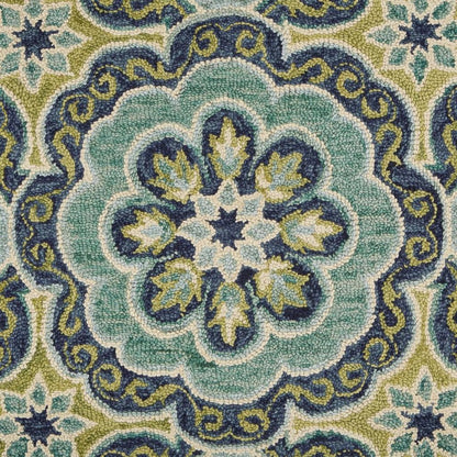 6' Green And Ivory Wool Geometric Hand Tufted Round Rug