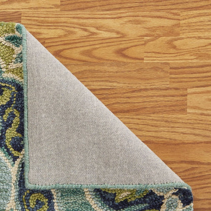 6' Green And Ivory Wool Geometric Hand Tufted Round Rug