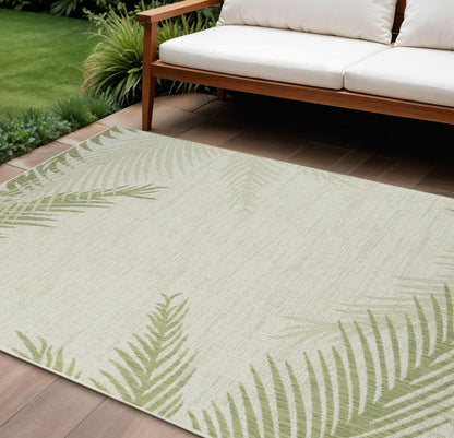 5' X 7' Beige And Green Palm Leaf Indoor Outdoor Area Rug