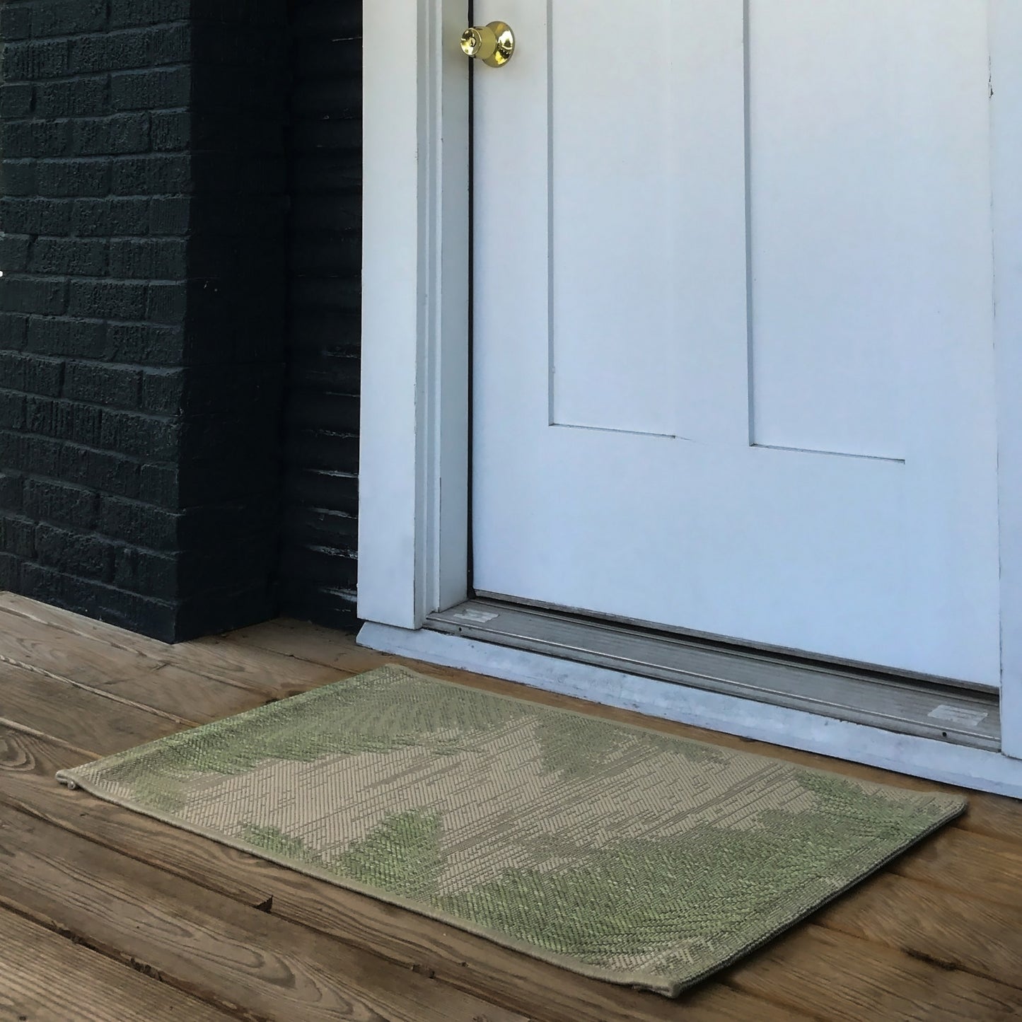 5' X 7' Beige Floral Indoor Outdoor Area Rug