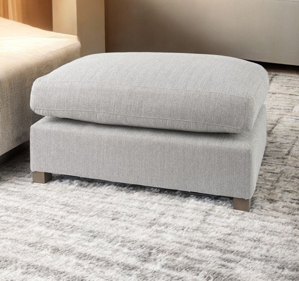 26" Light Gray Fabric and Brown Cocktail Ottoman