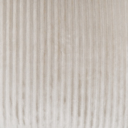 Beige corduroy fabric close-up with vertical ridges (wales) and soft textured surface.