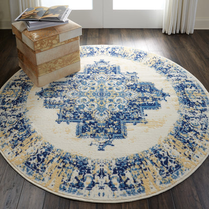 Round blue and ivory oriental rug with a detailed beige medallion pattern, ideal for living room decor.
