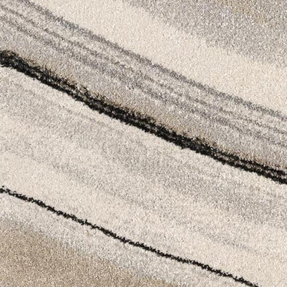 5' X 8' Cream and Tan Abstract Marble Area Rug