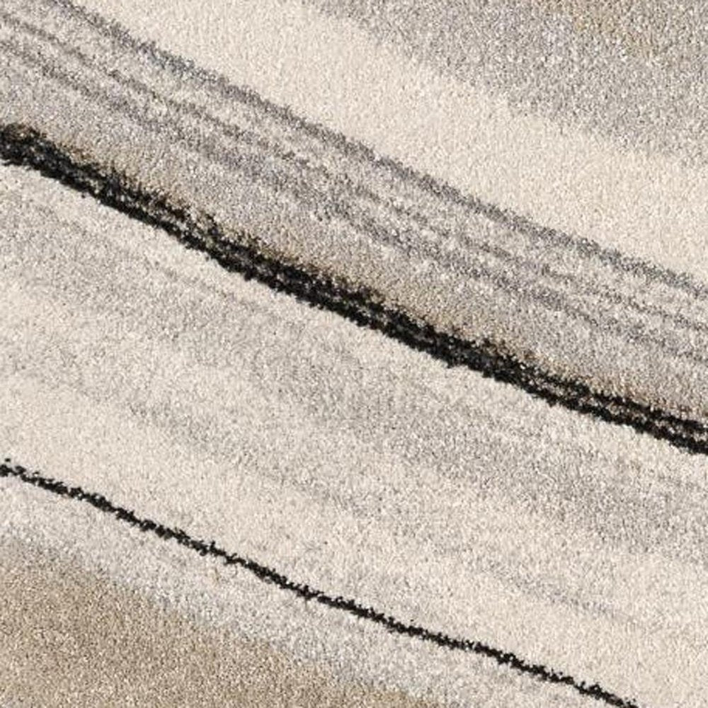 5' X 8' Cream and Tan Abstract Marble Area Rug