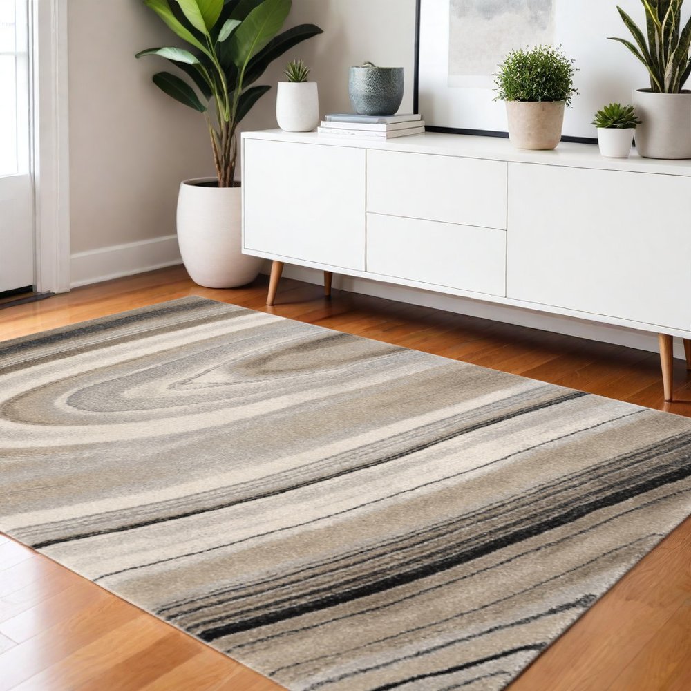5' X 8' Cream and Tan Abstract Marble Area Rug