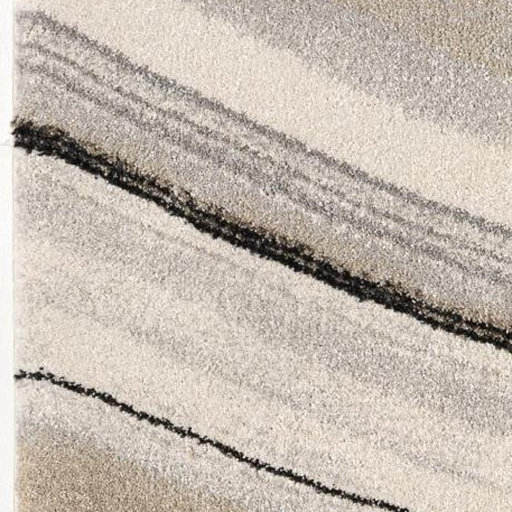 5' X 8' Cream and Tan Abstract Marble Area Rug