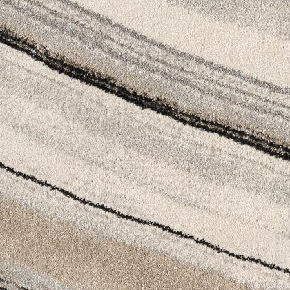 5' X 8' Cream and Tan Abstract Marble Area Rug