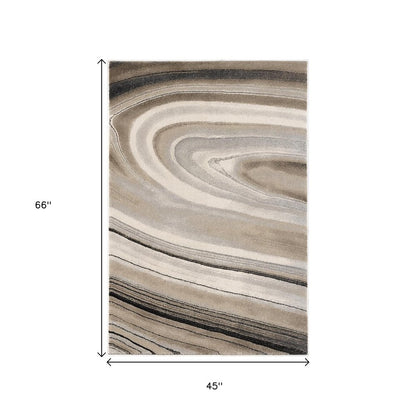 5' X 8' Cream and Tan Abstract Marble Area Rug