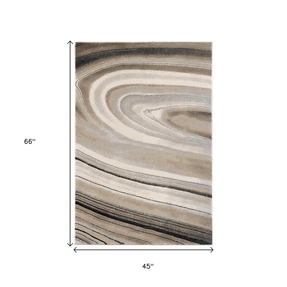 5' X 8' Cream and Tan Abstract Marble Area Rug