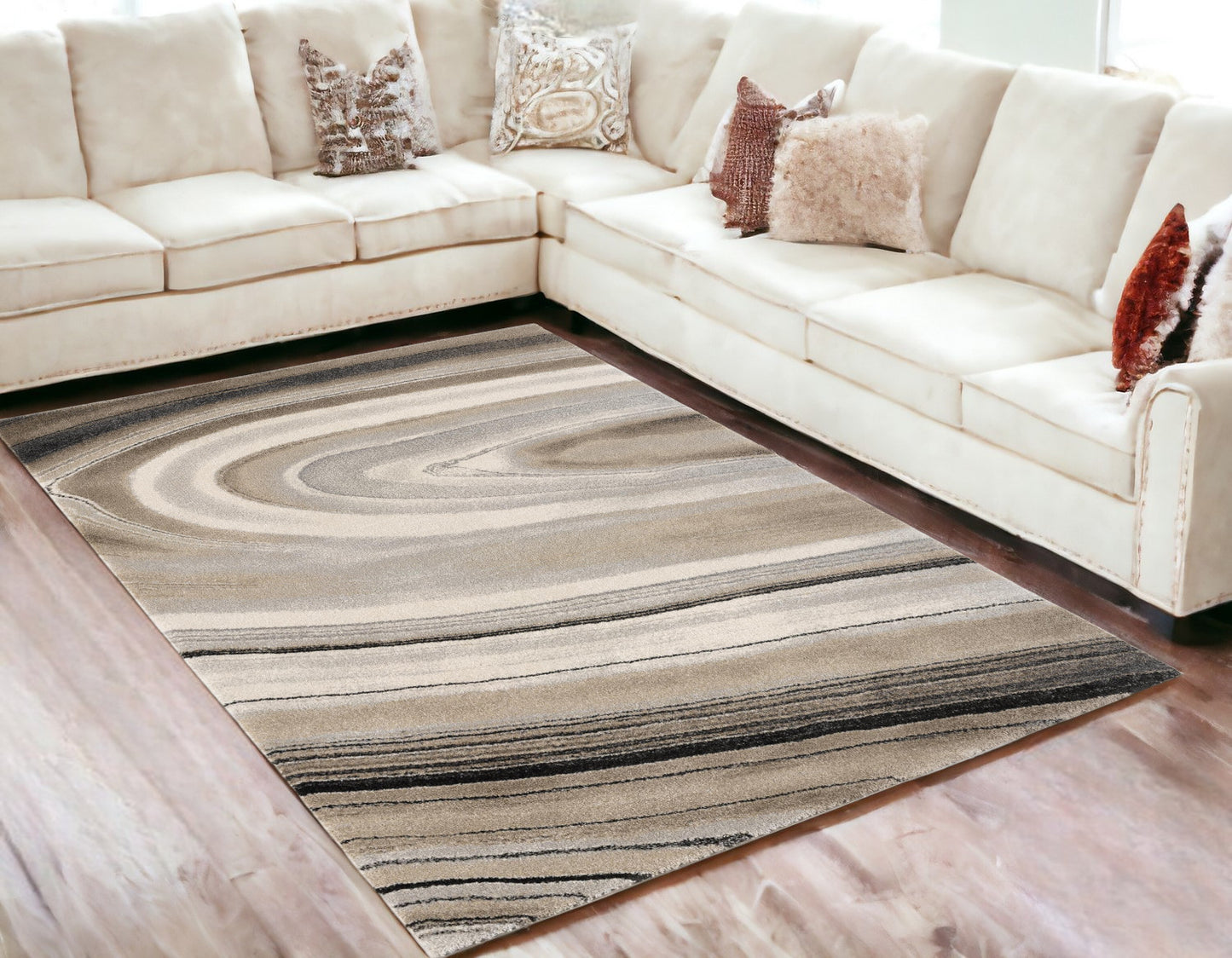 7' X 10' Cream and Tan Abstract Marble Area Rug