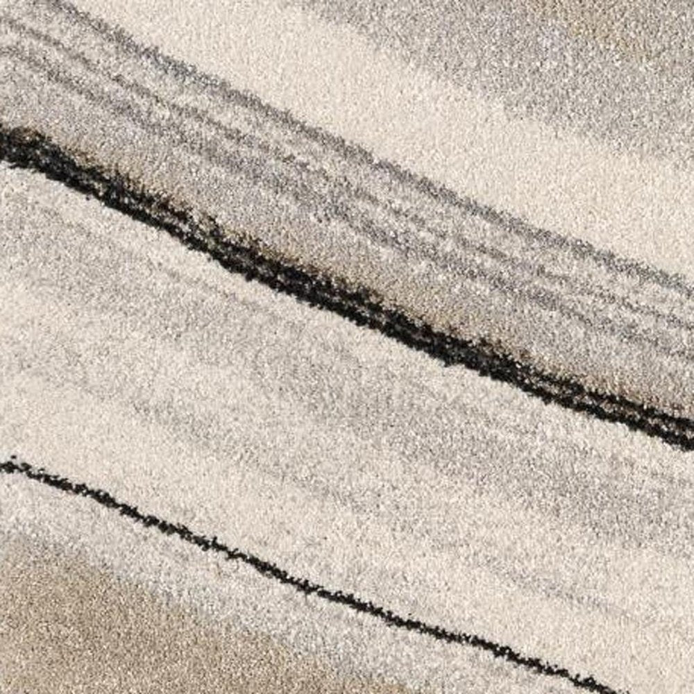 5' X 8' Cream and Tan Abstract Marble Area Rug