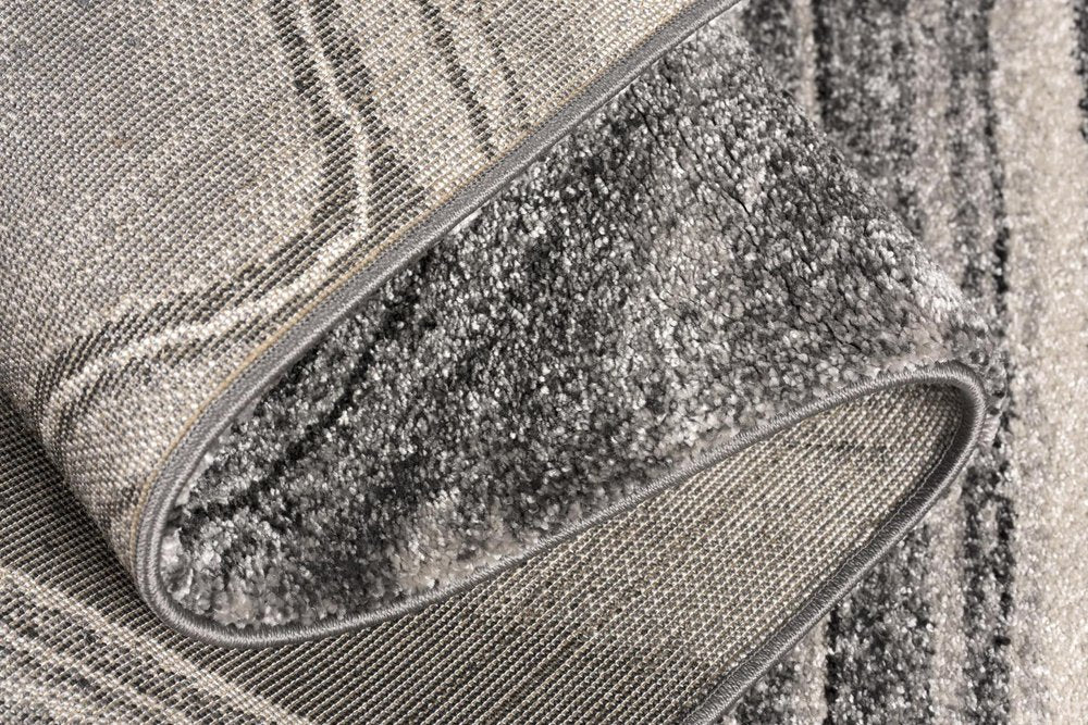 8' X 11' Gray And Ivory Abstract Shag Area Rug