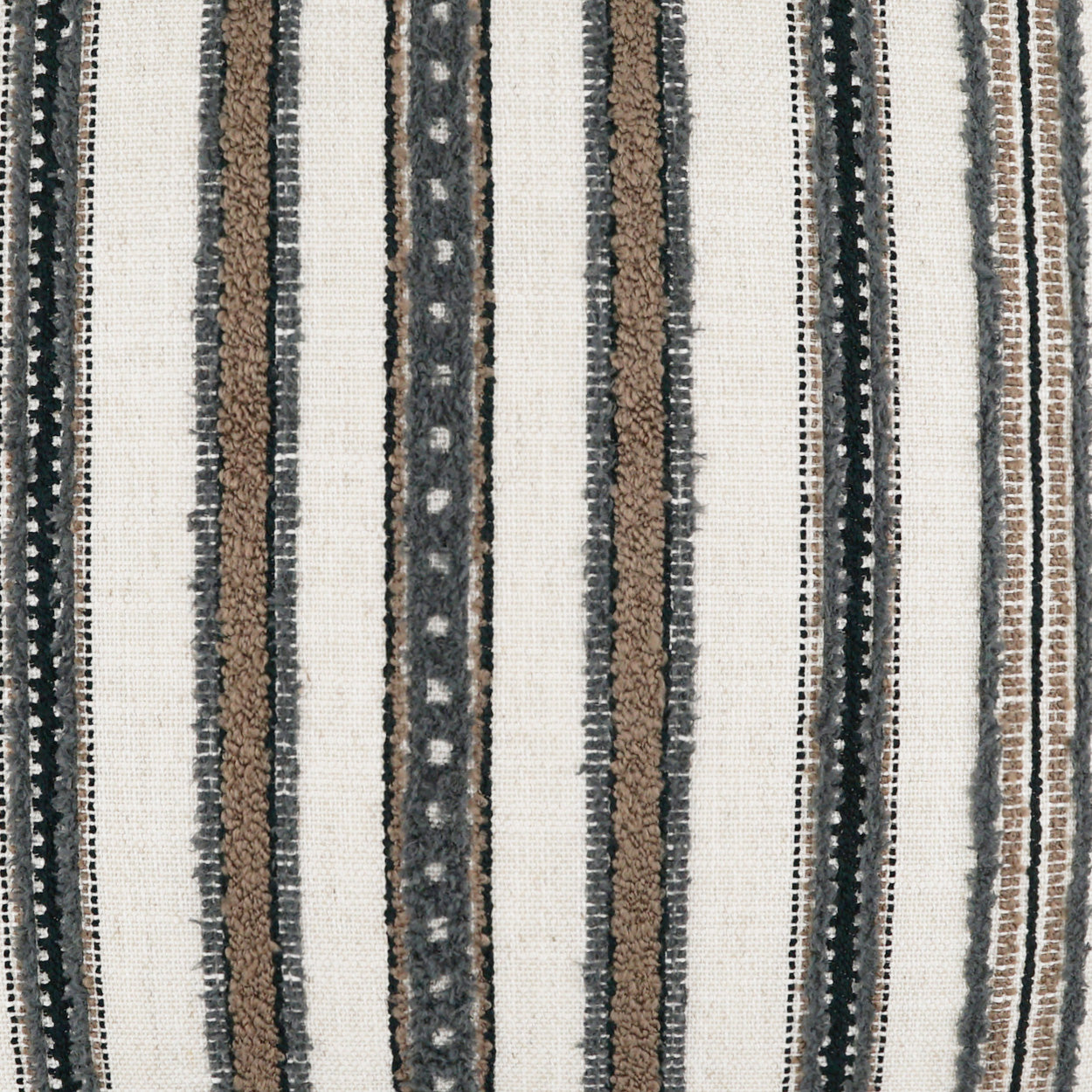 Vertical striped woven fabric with cream base and brown, tan, and charcoal stripes; textured upholstery textile.