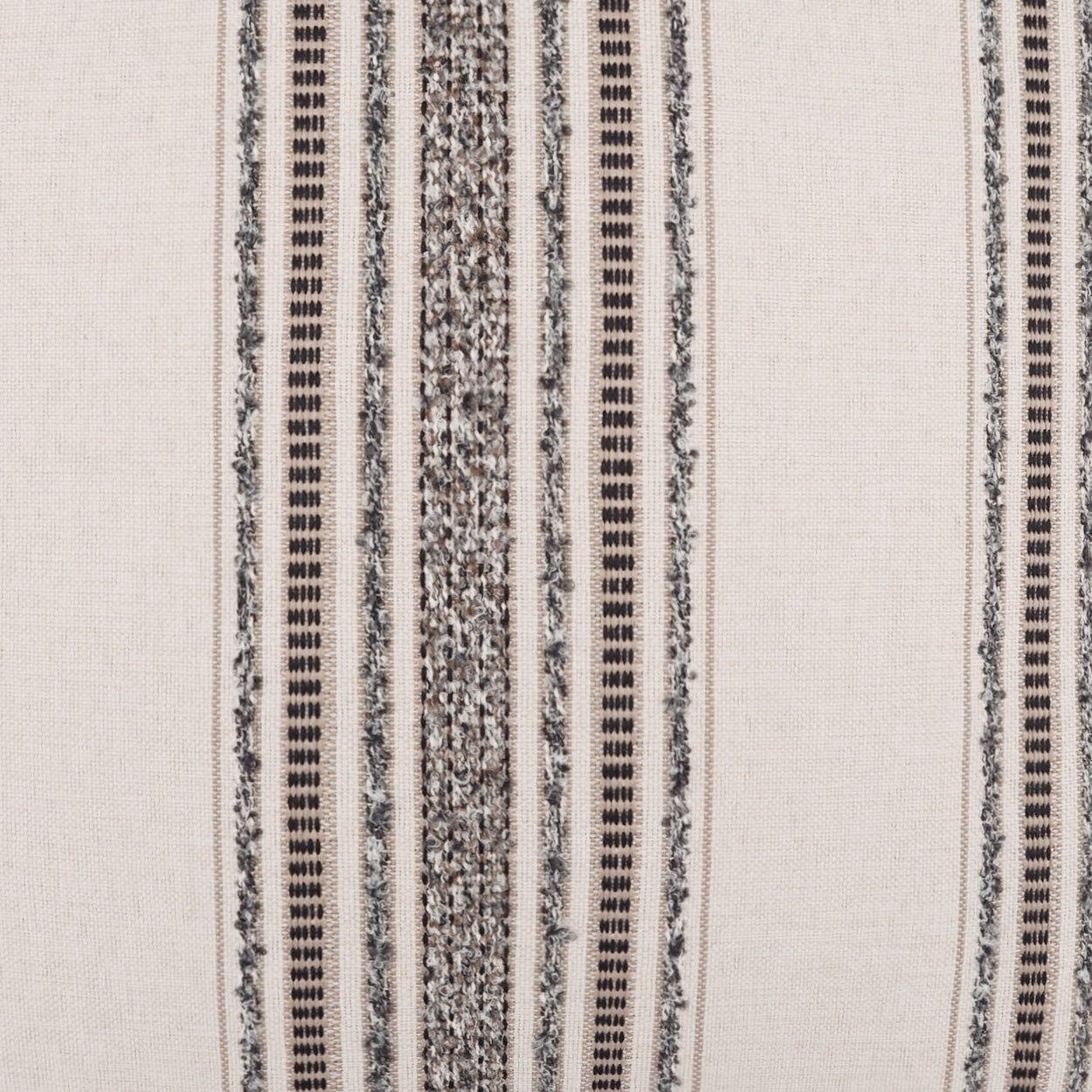 Beige woven pillow with vertical black & gray striped bands and a textured speckled center stripe.