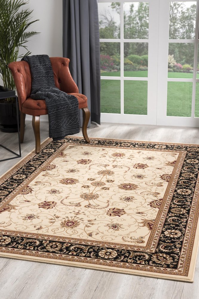 7' X 9' Black And Ivory Oriental Area Rug