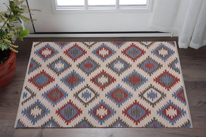 5' X 7' Red and Blue Geometric Diamonds Area Rug
