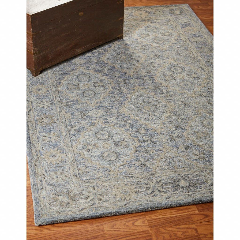 5' X 8' Blue and Tan Traditional Area Rug