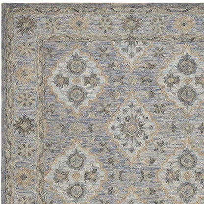 5' X 8' Blue and Tan Traditional Area Rug