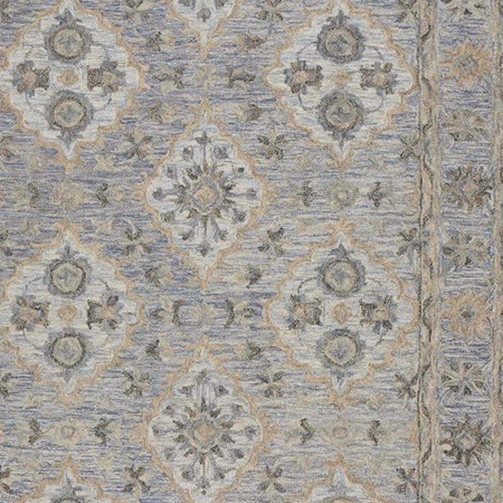 5' X 8' Blue and Tan Traditional Area Rug
