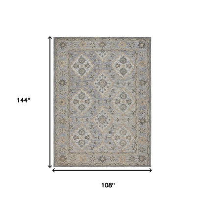 5' X 8' Blue and Tan Traditional Area Rug