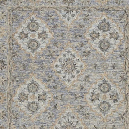 5' X 8' Blue and Tan Traditional Area Rug