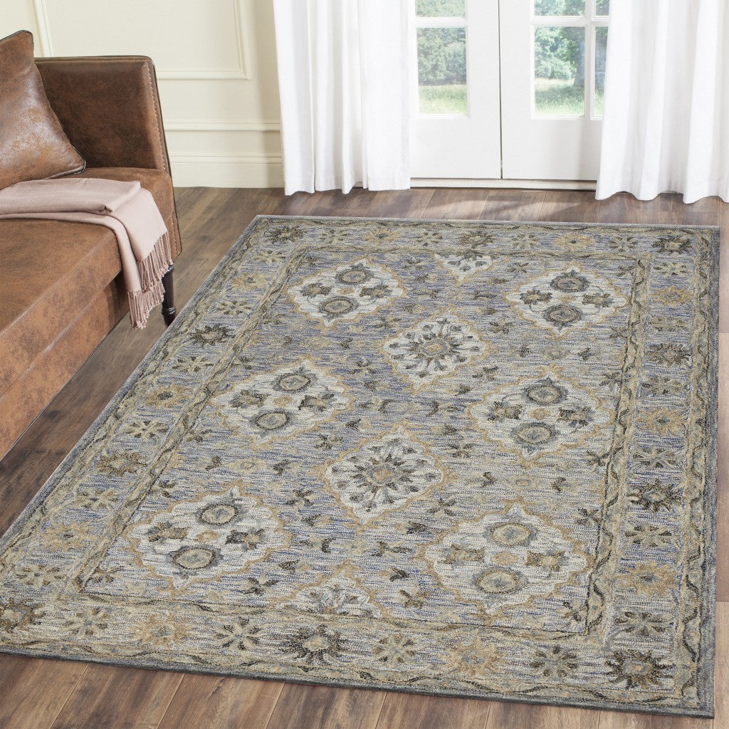 5' X 8' Blue and Tan Traditional Area Rug