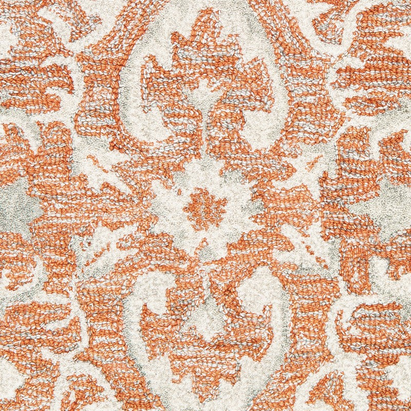 9' X 12' Orange and Ivory Medallion Area Rug