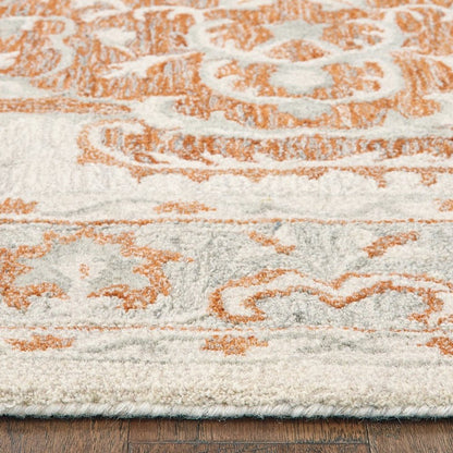 9' X 12' Orange and Ivory Medallion Area Rug