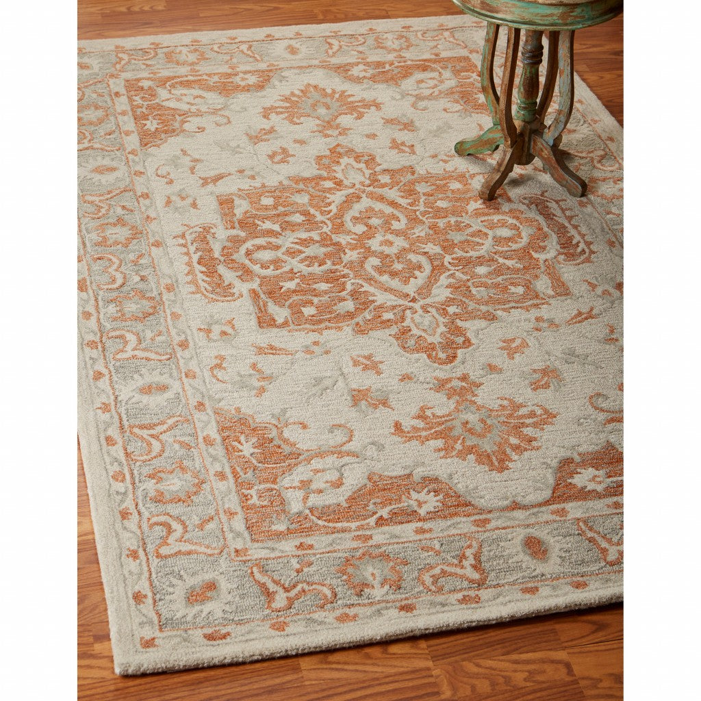 9' X 12' Orange and Ivory Medallion Area Rug