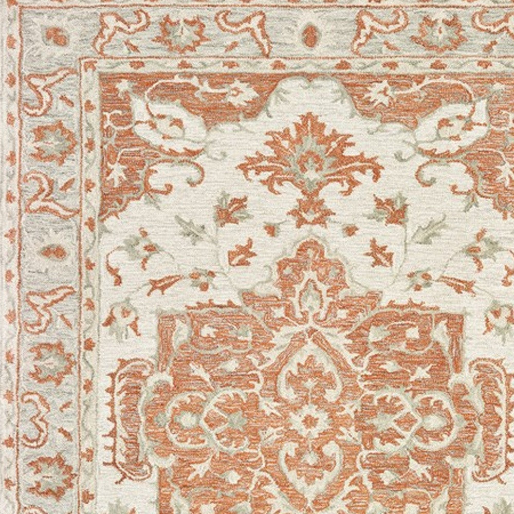 9' X 12' Orange and Ivory Medallion Area Rug