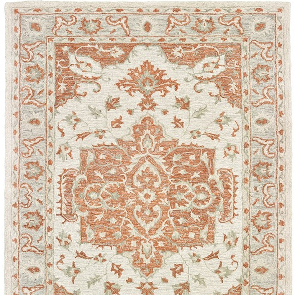 9' X 12' Orange and Ivory Medallion Area Rug