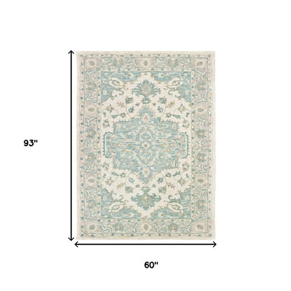 5' X 8' Turquoise and Cream Medallion Area Rug