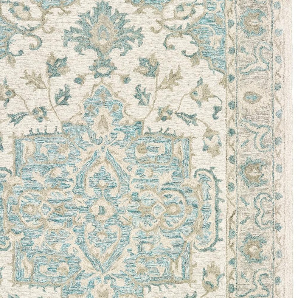 5' X 8' Turquoise and Cream Medallion Area Rug