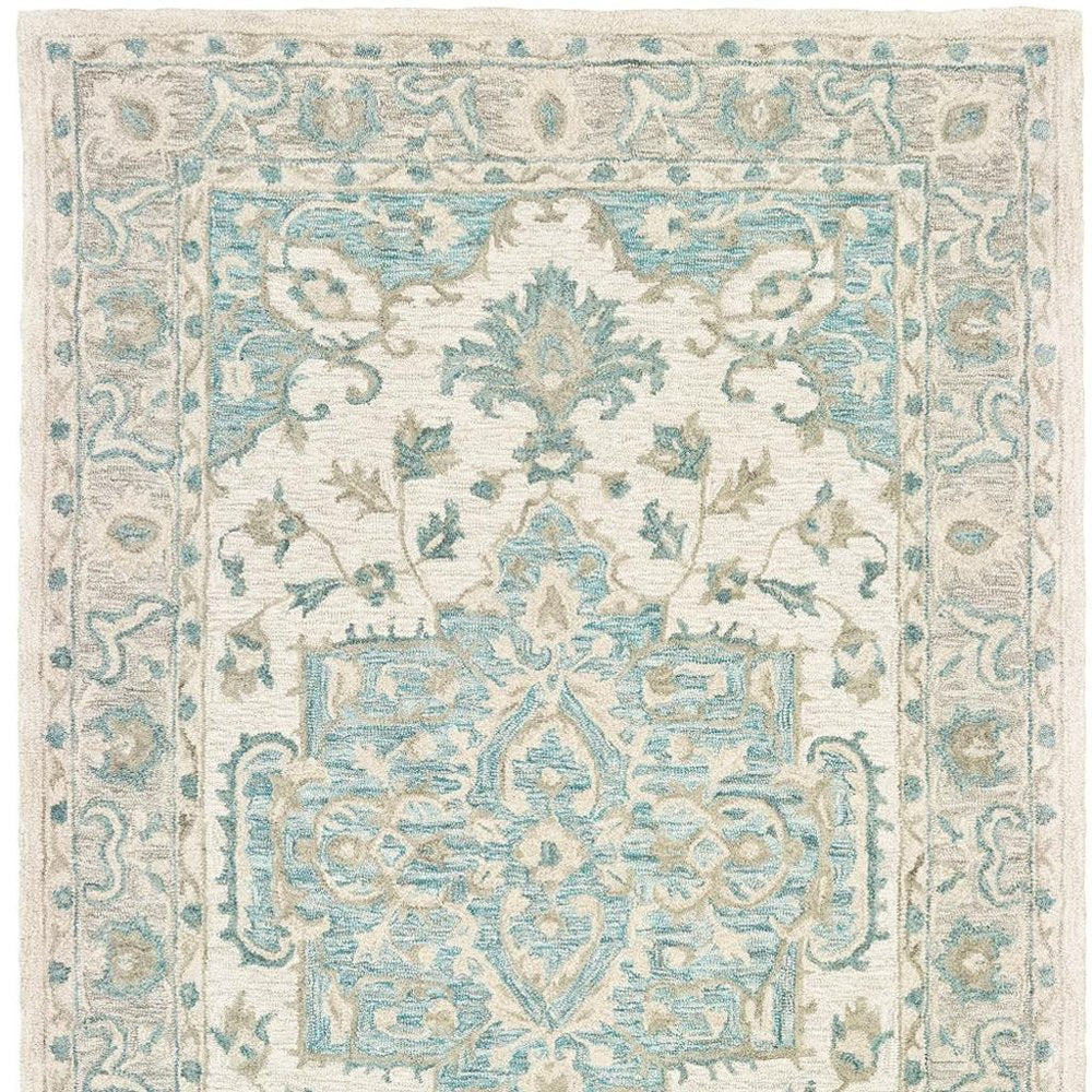 9' X 12' Turquoise and Cream Medallion Area Rug