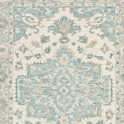 9' X 12' Turquoise and Cream Medallion Area Rug