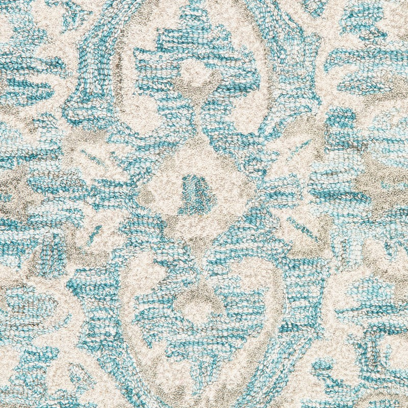 9' X 12' Turquoise and Cream Medallion Area Rug