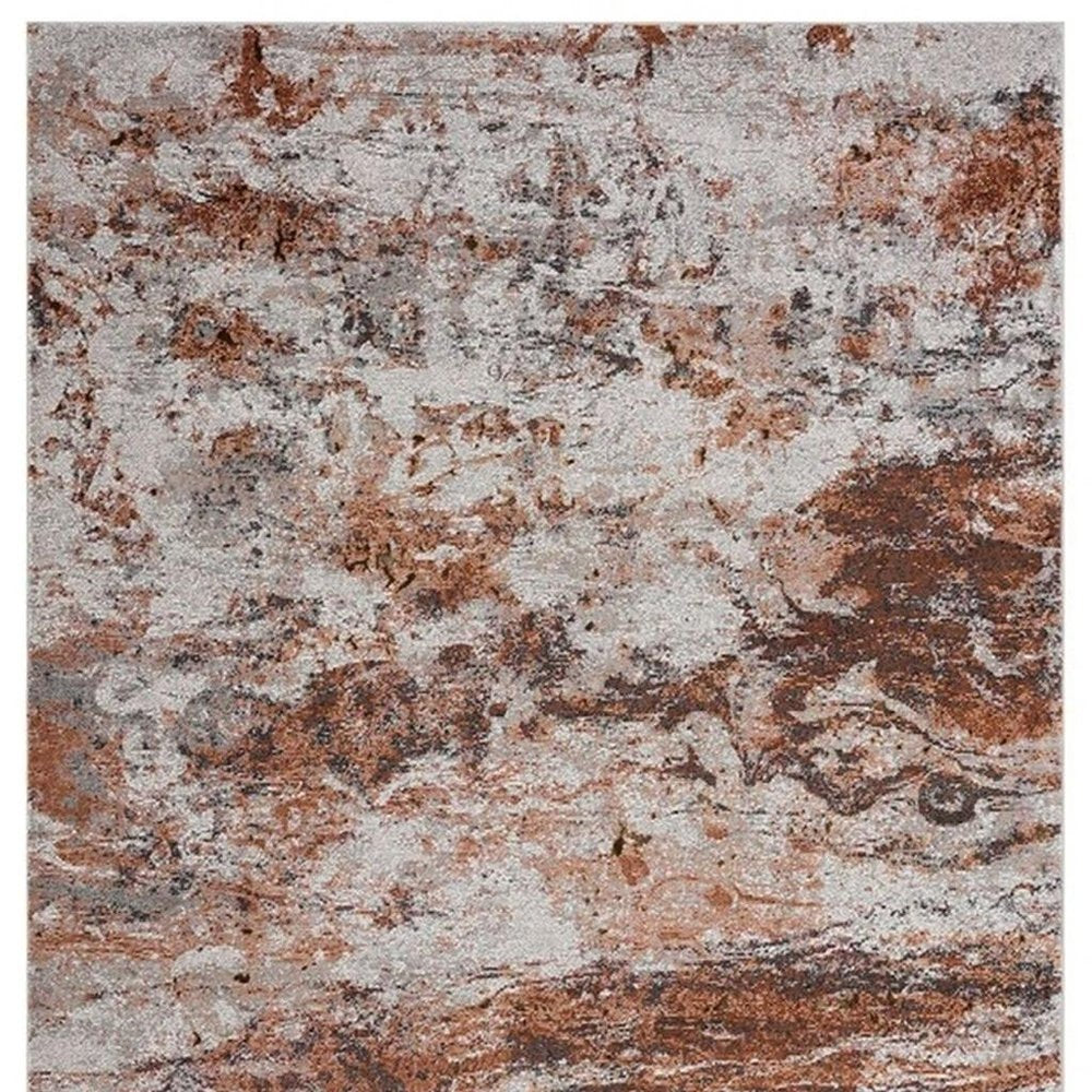 5' X 8' Brown and White Abstract Earth Area Rug