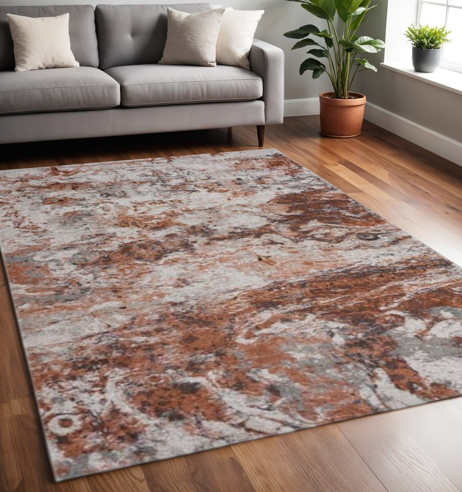 5' X 8' Brown and White Abstract Earth Area Rug