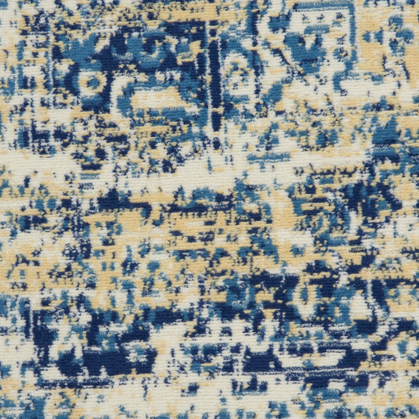 Distressed blue & cream oriental rug with tan accents; abstract geometric medallion motifs, soft woven texture