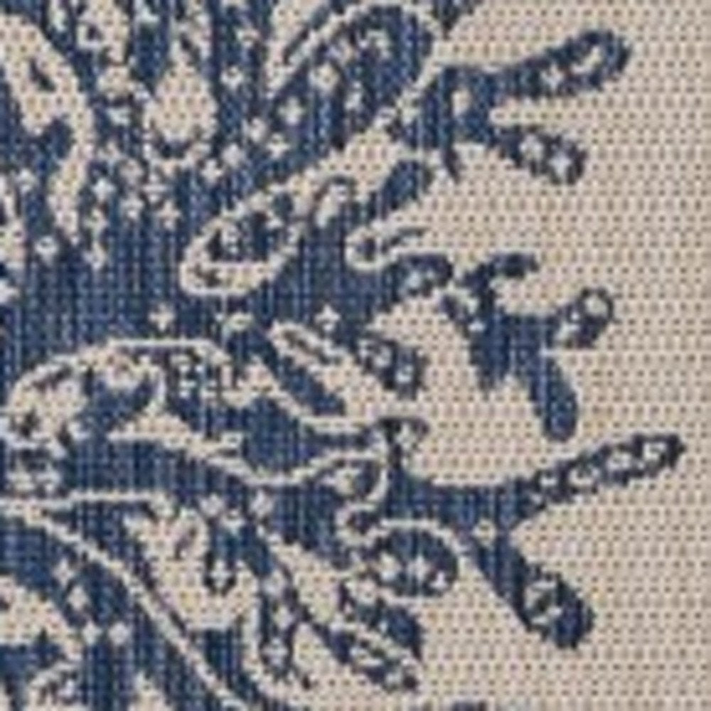 5' X 7' Beige And Blue Coral Indoor Outdoor Area Rug