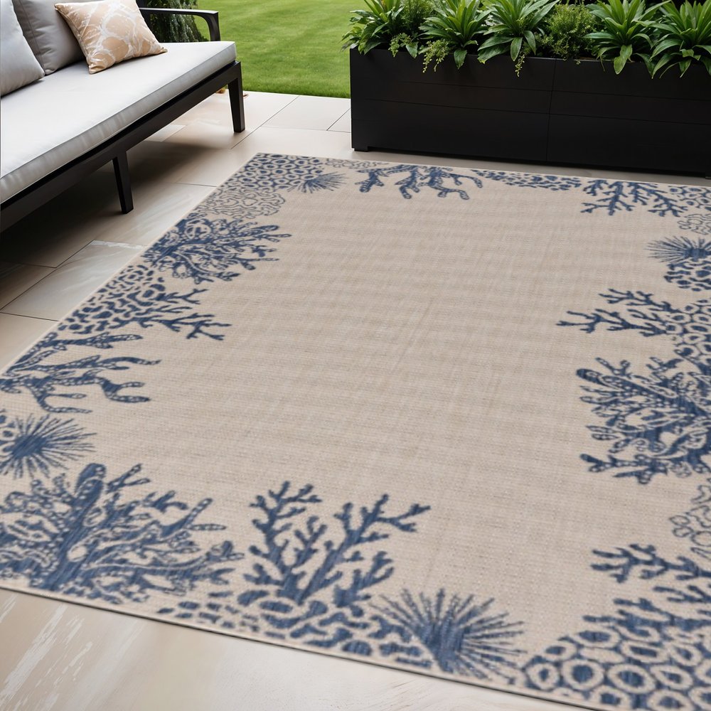 5' X 7' Beige And Blue Coral Indoor Outdoor Area Rug