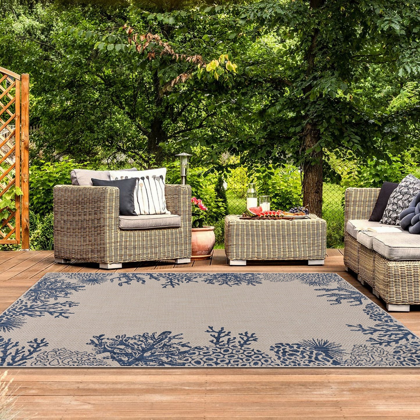 5' X 7' Beige and Blue Coral Stain Resistant Indoor Outdoor Area Rug