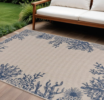 5' X 7' Beige And Blue Coral Indoor Outdoor Area Rug