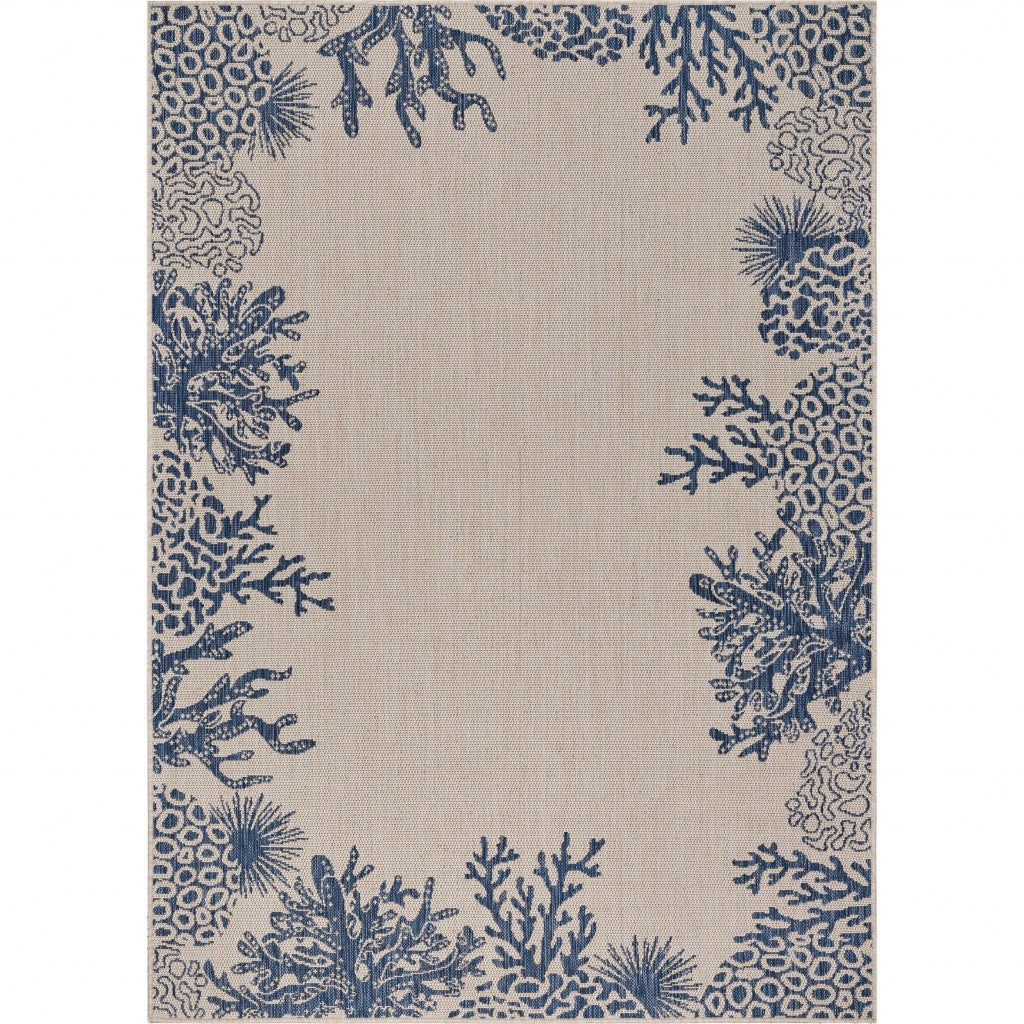 5' X 7' Beige and Blue Coral Stain Resistant Indoor Outdoor Area Rug