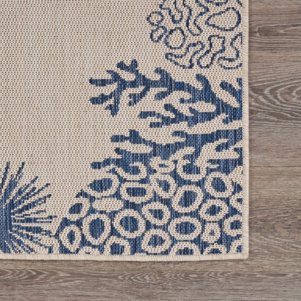 5' X 7' Beige and Blue Coral Stain Resistant Indoor Outdoor Area Rug