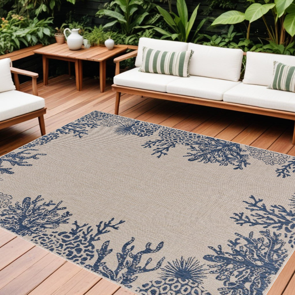 5' X 7' Beige and Blue Coral Stain Resistant Indoor Outdoor Area Rug