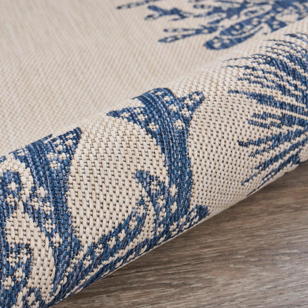 2' X 3' Beige and Blue Coral Stain Resistant Indoor Outdoor Area Rug