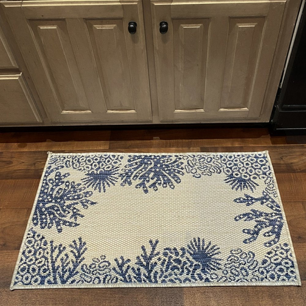 5' X 7' Beige And Blue Coral Indoor Outdoor Area Rug