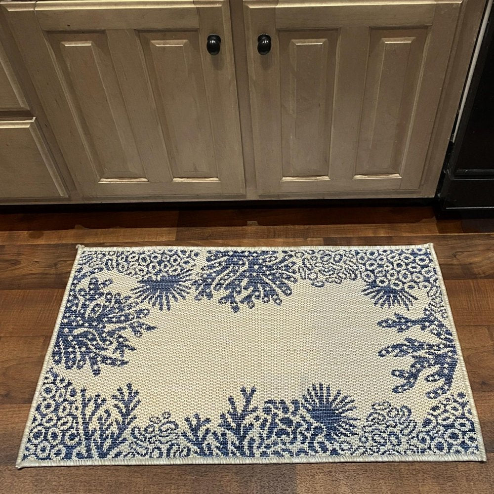 2' X 3' Beige and Blue Coral Stain Resistant Indoor Outdoor Area Rug